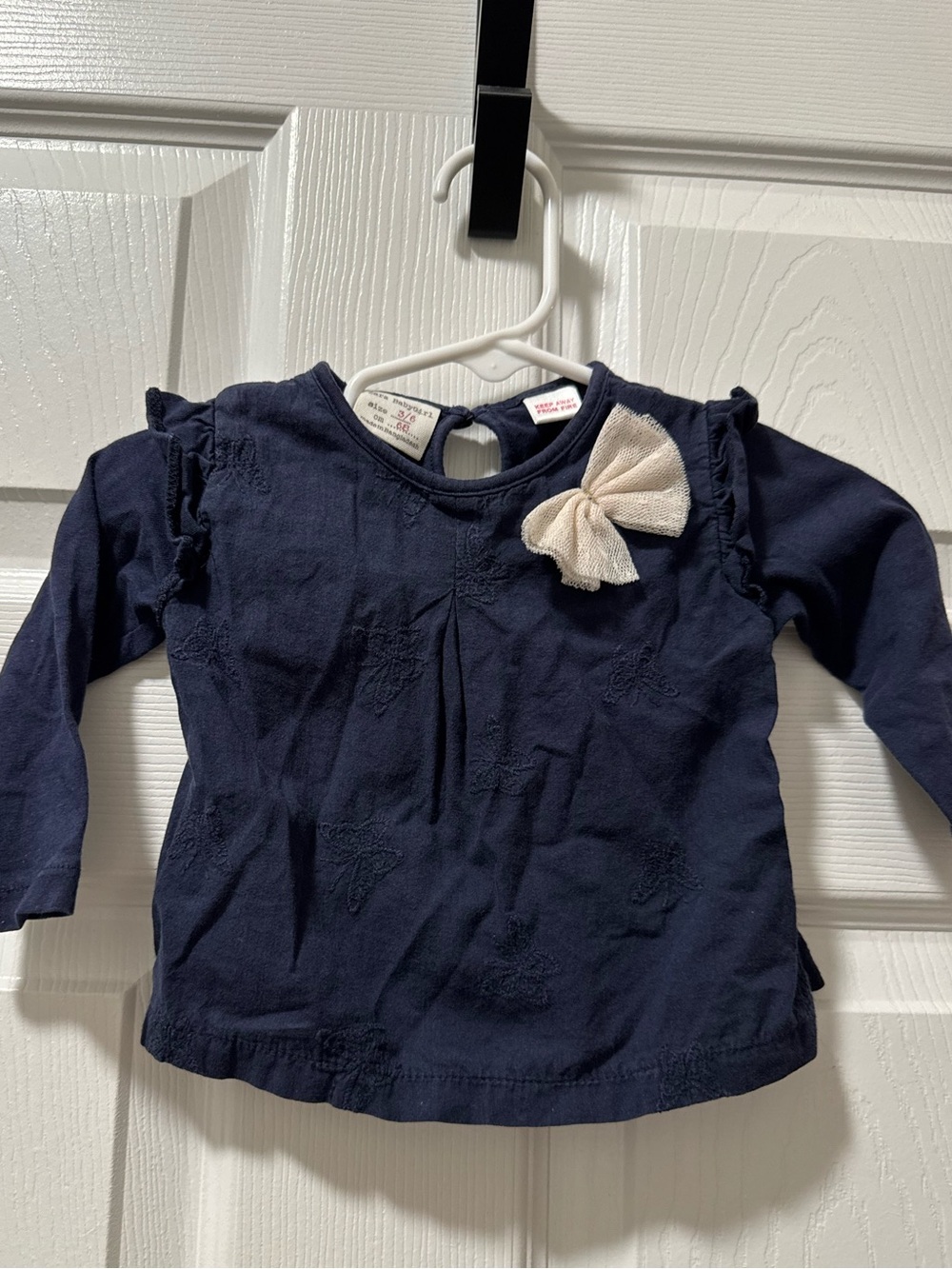 Zara Navy Long-Sleeve Top with Ivory Bow Accent